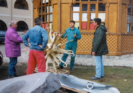 The final look of the Romanian-Transylvanian house with the symbols of Sun and Moon is being created: in the high of 24 metres are working tilers of Mr. Antal Ambrus from Vek Meder and tinsmiths from the company Brothers Farkas from Vydrany.