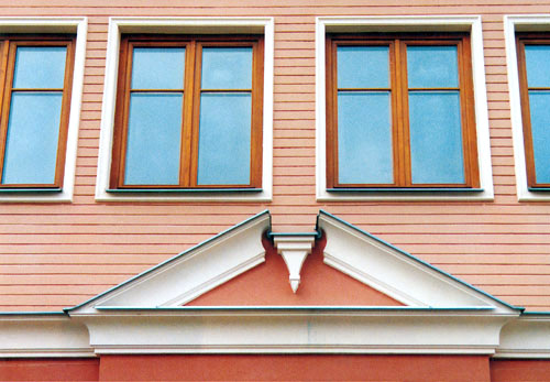 The stucco ornaments above the entrance of the Danish House