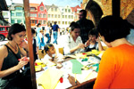 Children learning to create the works from the paper (origami) on the occasion of the open house