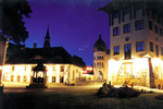 The evening view of the square from the Zichy Palace